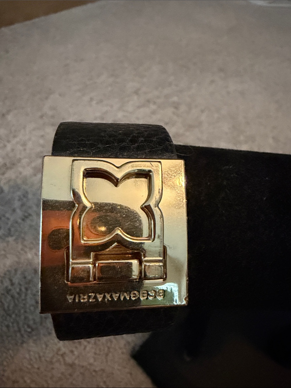 BCBGMaxAzria Black Leather Bracelet with Gold Logo Plate